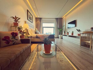 Living Room in Studio Apartment at AIPL Joy Street, Sector 66 – for Rent