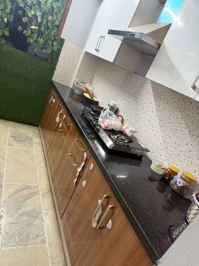 Kitchen, ansal-api-esencia-wood-winds 3 Bedroom 1394 Sq.Ft. Apartment In Sector 67 Gurgaon 10653711