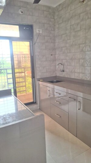 Kitchen in 1 BHK Apartment at RS Tirupati Corner, Ulwe Sector 23 – for Rent