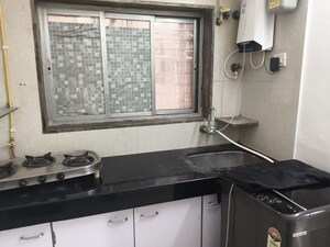 Kitchen in 1 BHK Apartment at Uma Irla Apartment, Vile Parle West – for Rent