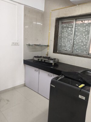 Kitchen in 1 BHK Apartment at Uma Irla Apartment, Vile Parle West – for Rent