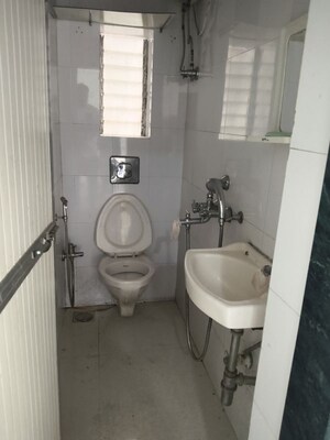 Bathroom in 1 BHK Apartment at Uma Irla Apartment, Vile Parle West – for Rent