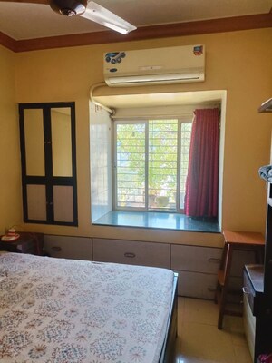 Living Room in 2 BHK Apartment at Kailash Darshan CHS, Dahisar East – for Sale