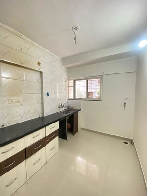 Kitchen in 2 BHK Apartment at Dnv Arcelia, Ravet – for Rent