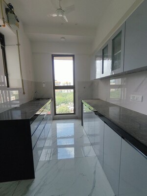 Kitchen in 2 BHK Apartment at Raymond Ten X Habitat, Pokhran Road No Two – for Rent
