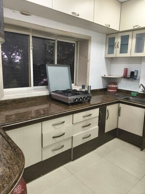 Kitchen in 1 BHK Apartment at Grant Road East – for Rent