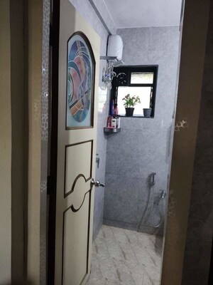 Bathroom in 2 BHK Apartment at Surya Kiran CHS Ghansoli, Ghansoli – for Rent