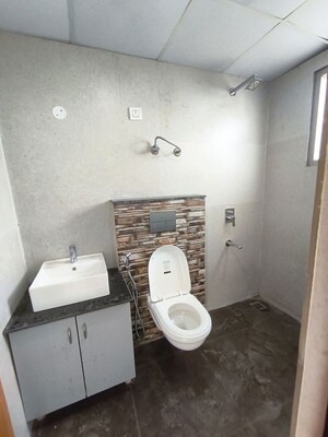 Bathroom in 3 BHK Apartment at Malwa Escon Primera, International Airport Road – for Rent