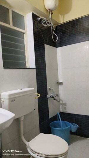 Bathroom in 2 BHK Apartment at Phadnis Green Square, Baner – for Rent