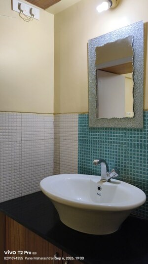 Bathroom in 2 BHK Apartment at Phadnis Green Square, Baner – for Rent