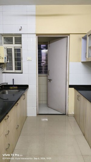 Kitchen in 2 BHK Apartment at Phadnis Green Square, Baner – for Rent
