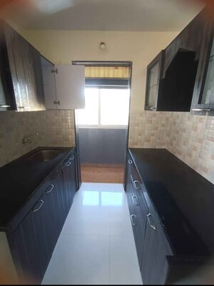 Kitchen in 1 BHK Apartment at Lotus Lotus Link Square, Malad West – for Rent