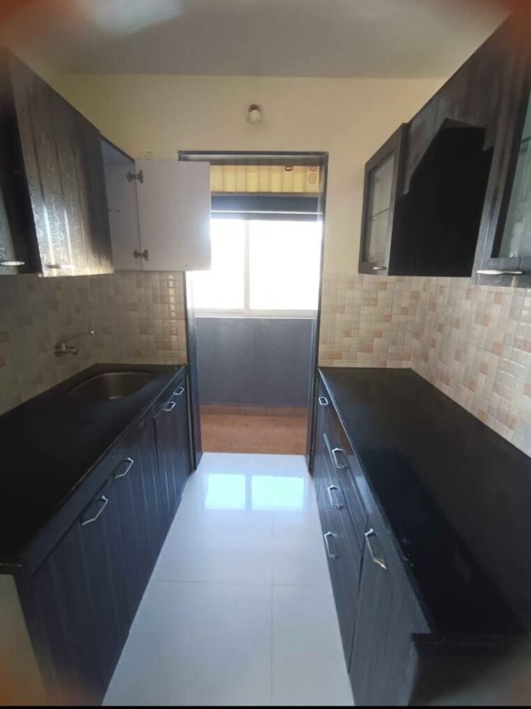Kitchen, lotus-lotus-link-square 1 Bedroom 700 Sq.Ft. Apartment In Malad West Mumbai 10654589