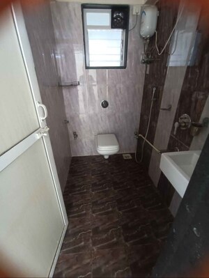 Bathroom in 1 BHK Apartment at Lotus Lotus Link Square, Malad West – for Rent