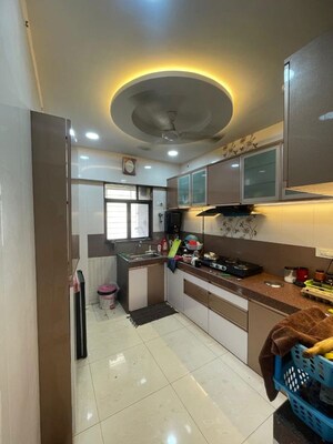 Kitchen in 2 BHK Apartment at Jasmine Tower, Vasant Vihar – for Rent