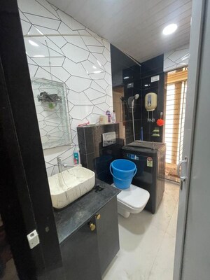 Bathroom in 2 BHK Apartment at Jasmine Tower, Vasant Vihar – for Rent