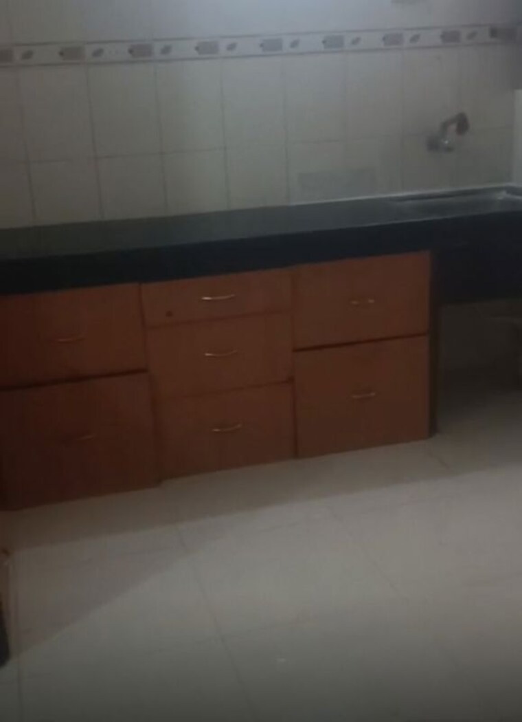 Kitchen, renuka-nirmiti 2 Bedroom 1000 Sq.Ft. Apartment In Chinchwad Pune 10654990