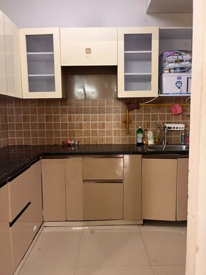 Kitchen in 2 BHK Apartment at Mahagun My Woods, Sector 16c Greater Noida – for Rent