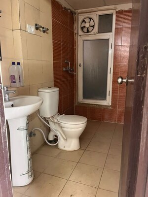 Bathroom in 2 BHK Apartment at Mahagun My Woods, Sector 16c Greater Noida – for Rent