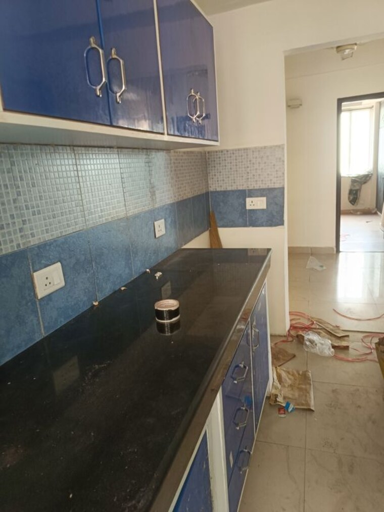 Kitchen, sikka-karmic-greens 2.5 Bedroom 1210 Sq.Ft. Apartment In Sector 78 Noida 10655062