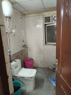Bathroom in 2 BHK Apartment at Aims Golf City, Sector 75 – for Rent