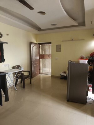 Living Room in 2 BHK Apartment at Aims Golf City, Sector 75 – for Rent