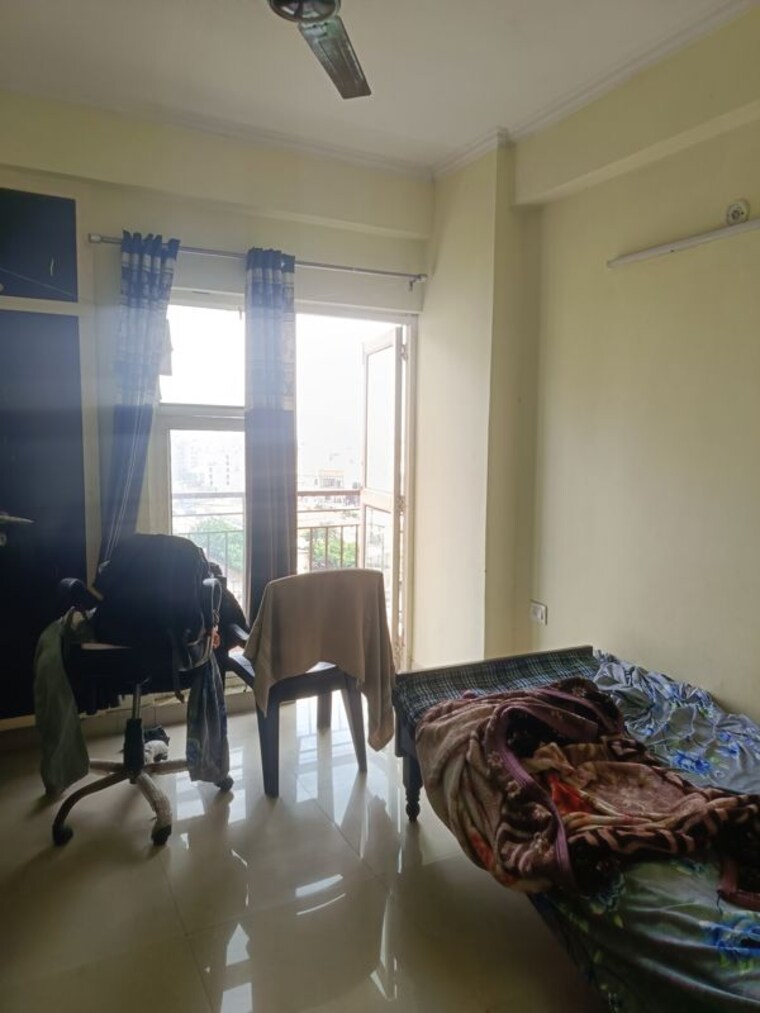 Living Room, aims-golf-city 2 Bedroom 950 Sq.Ft. Apartment In Sector 75 Noida 10655119