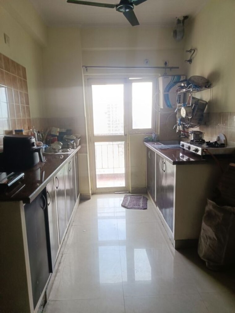Kitchen, aims-golf-city 2 Bedroom 950 Sq.Ft. Apartment In Sector 75 Noida 10655119