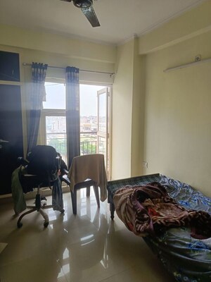 Living Room in 2 BHK Apartment at Aims Golf City, Sector 75 – for Rent