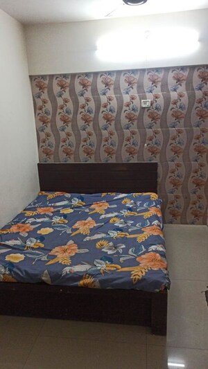 Bedroom in 2 BHK Apartment at Dheeraj Ganga, Malad West – for Rent