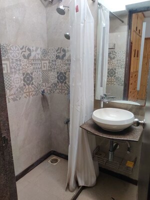 Bathroom in 1 BHK Apartment at Lotus Lotus Link Square, Malad West – for Rent