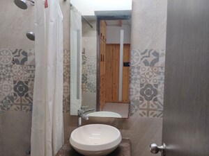 Bathroom in 1 BHK Apartment at Lotus Lotus Link Square, Malad West – for Rent