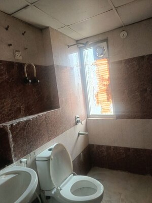 Bathroom in 3 BHK Apartment at Unnati Fortune The Aranya, Sector 119 – for Rent