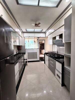 Kitchen in 4 BHK Apartment at Oberoi Sky Gardens, Andheri West – for Rent