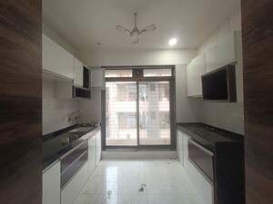 Kitchen in 1 BHK Apartment at Baba Solitaire, Vashi Sector 26 – for Rent