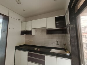 Kitchen in 1 BHK Apartment at Baba Solitaire, Vashi Sector 26 – for Rent
