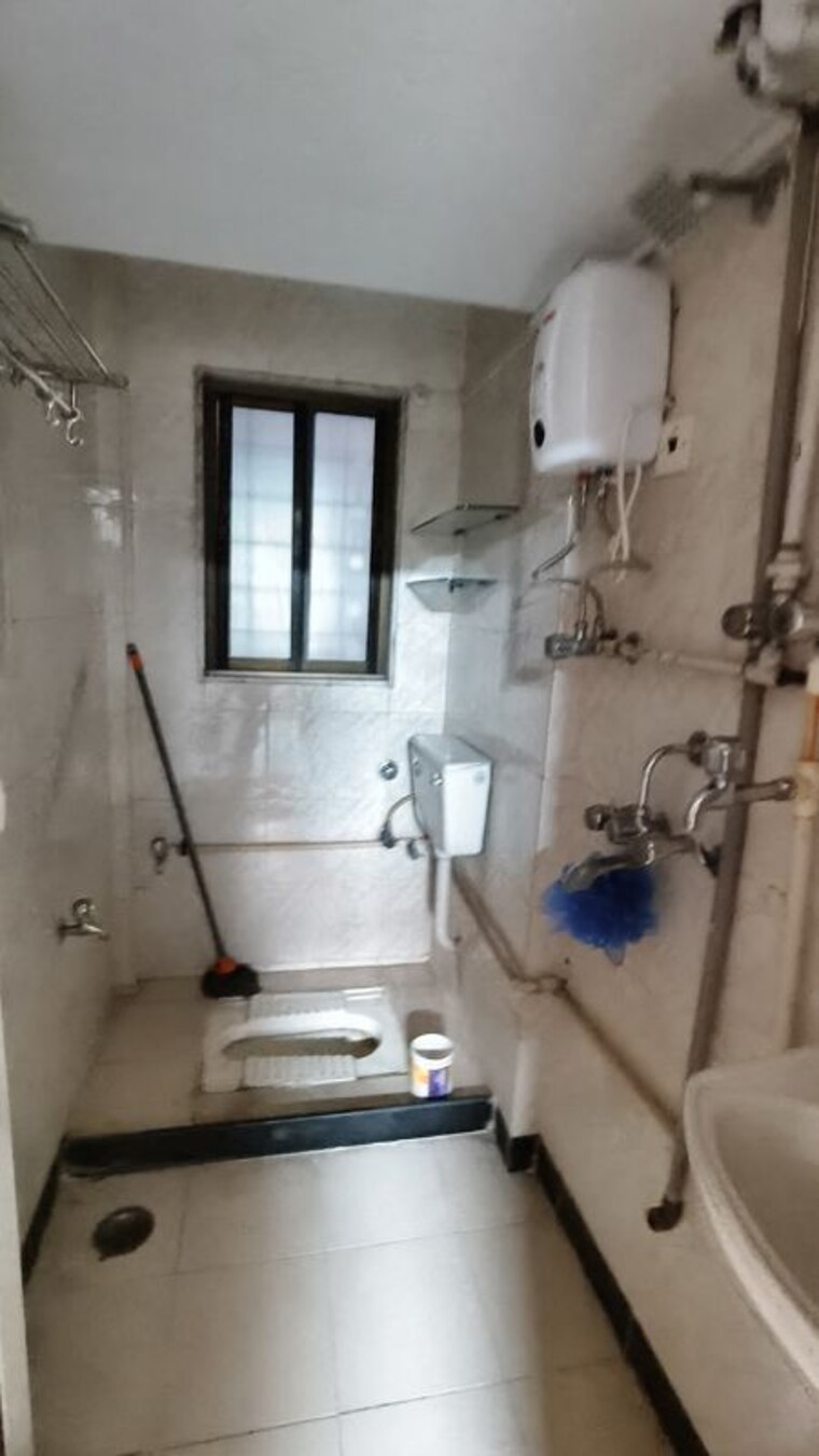 Bathroom, ami-jharna 1 Bedroom 645 Sq.Ft. Apartment In Goregaon East Mumbai 10655241