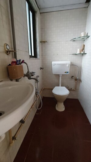 Bathroom in 1 BHK Apartment at AMI Jharna, Goregaon East – for Rent