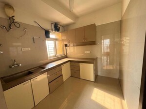 Kitchen in 3 BHK Apartment at Dosti Group Imperia, Manpada – for Rent