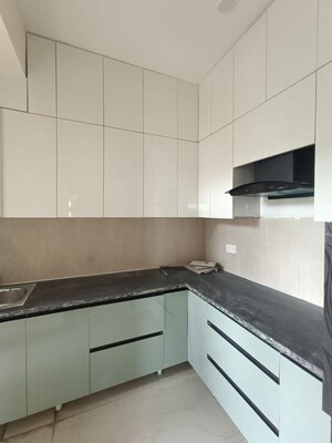 Kitchen in 2 BHK Apartment at Mahagun Mywoods, Sector 16c Greater Noida – for Rent