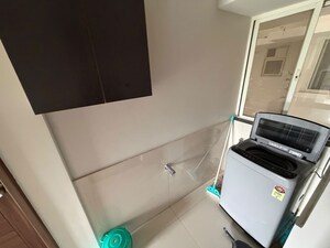 Laundry Area in 2 BHK Apartment at Megapolis Serenity, Hinjewadi – for Rent
