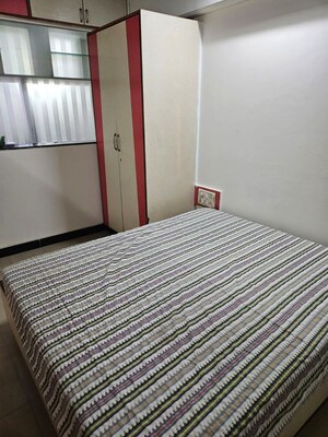 Bedroom in 3 BHK Penthouse at Balaji Garden CHS, Kopar Khairane – for Sale