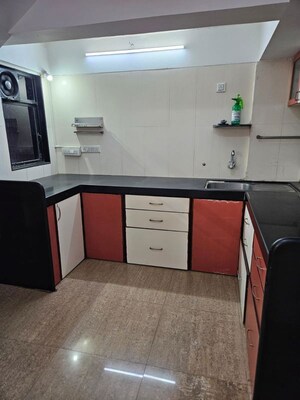 Kitchen in 3 BHK Penthouse at Balaji Garden CHS, Kopar Khairane – for Sale