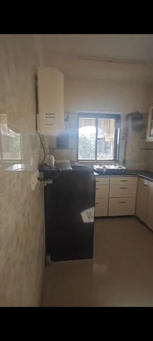 Kitchen in 1 BHK Apartment at Swastik Society Vile Parle West, Juhu – for Rent