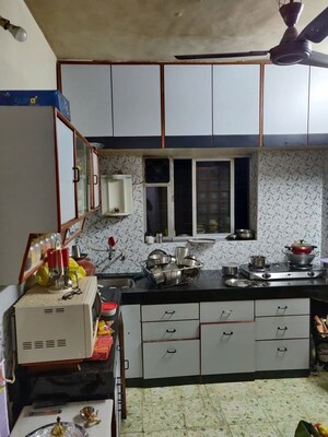 Kitchen in 2 BHK Apartment at Dodke Terrace, Warje – for Rent