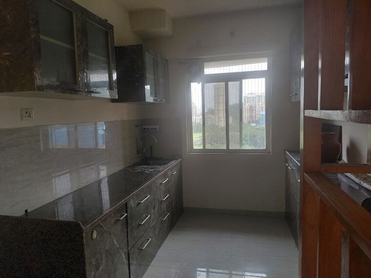 Kitchen, puraniks-tokyo-bay 2 Bedroom 572 Sq.Ft. Apartment In Kasarvadavali Thane 10655333