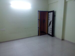 Room in 2 BHK Apartment at Dahanukar Colony – for Sale