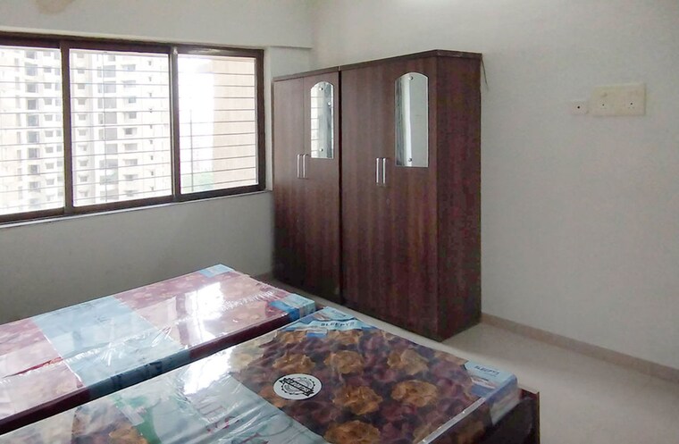 Bedroom, mulund west Pg For Boys In Mulund West 10655377