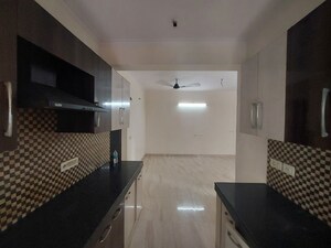 Kitchen in 2.5 BHK Apartment at Saviour Park, Mohan Nagar – for Sale