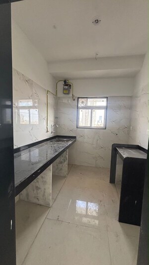 Kitchen in 2 BHK Apartment at Dem Phoenix, Malad East – for Rent